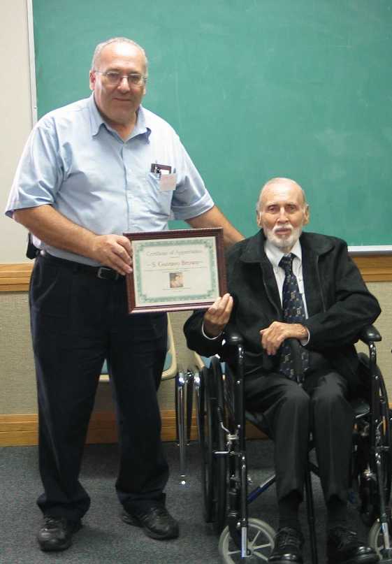 Steve Petrie presenting award to S. Gustavo Brown - 10-21-05