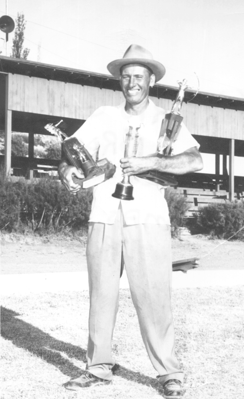 Thomas Patrick ("Porfie") Brown wth some of his archery trophies